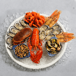 Livraison de plateau de fruits de mer avec du homard